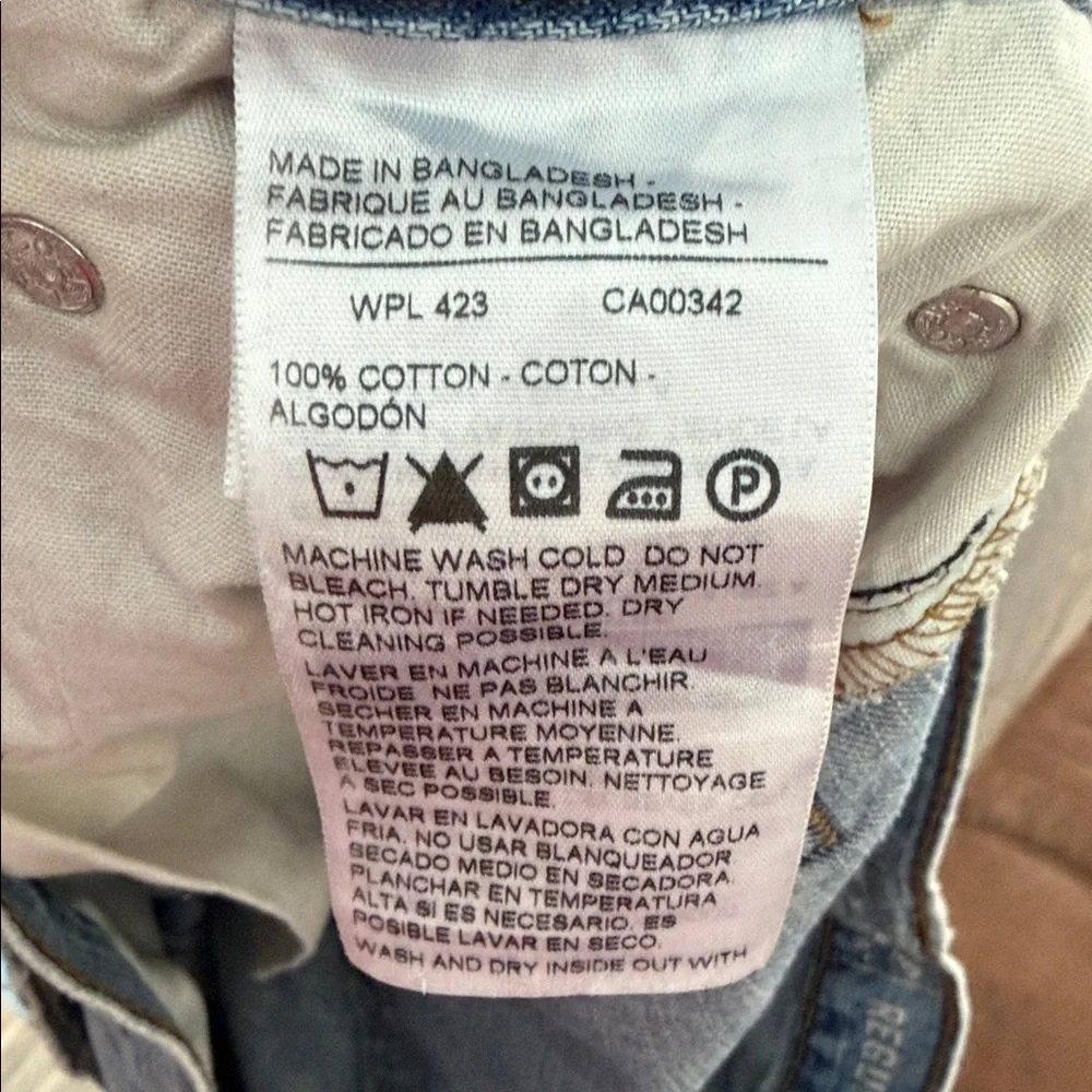 Levi's Light Blue Straight Jeans with Distressed Details